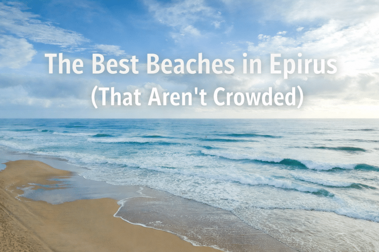 Serene sandy beach in Epirus, Greece with gentle waves rolling onto shore under a soft blue sky, featuring overlaid text reading “The Best Beaches in Epirus (That Aren’t Crowded).”