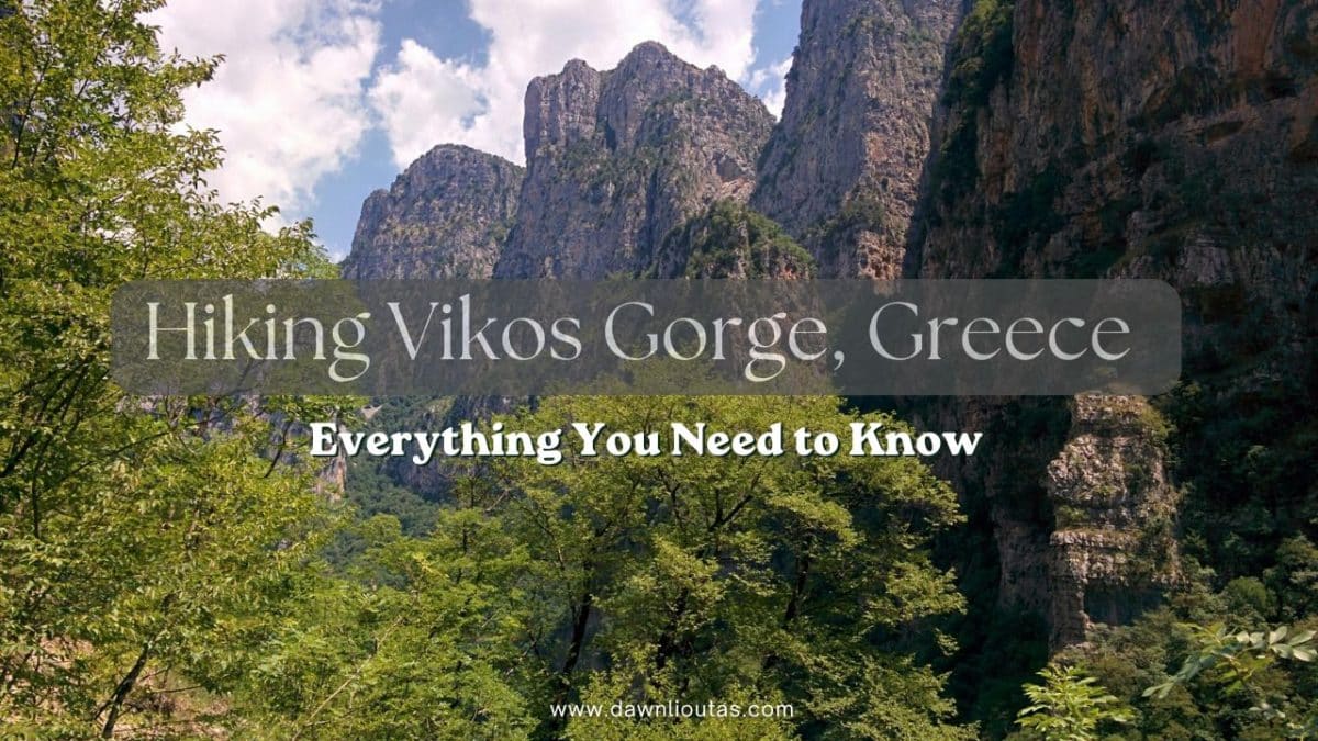 View of Vikos Gorge in Zagori, Epirus Greece with steep cliffs and forest during a hiking trail in Vikos–Aoös National Park