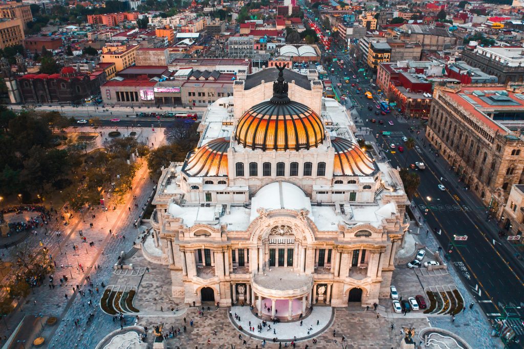 Aerial view of Palacio de Bellas Artes in Mexico City at dusk