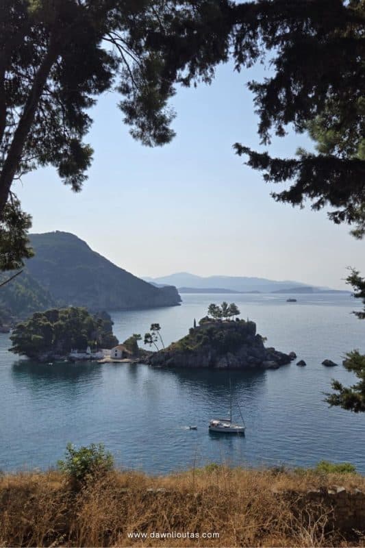 View of Panagia island in Parga Greece with turquoise water and coastal landscape
