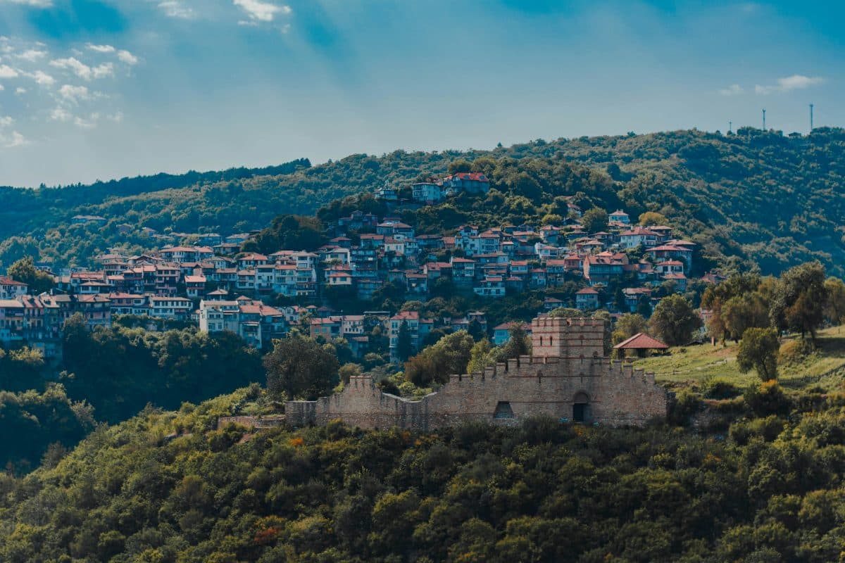 Veliko Tarnovo Bulgaria with Tsarevets Fortress and colorful hillside houses, an affordable destination in Eastern Europe