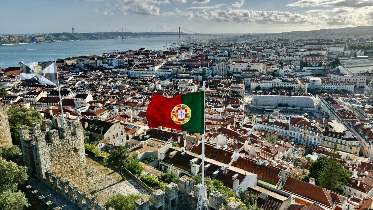 view from castelo de sao jorge overlooking lisbon rooftops and tagus river