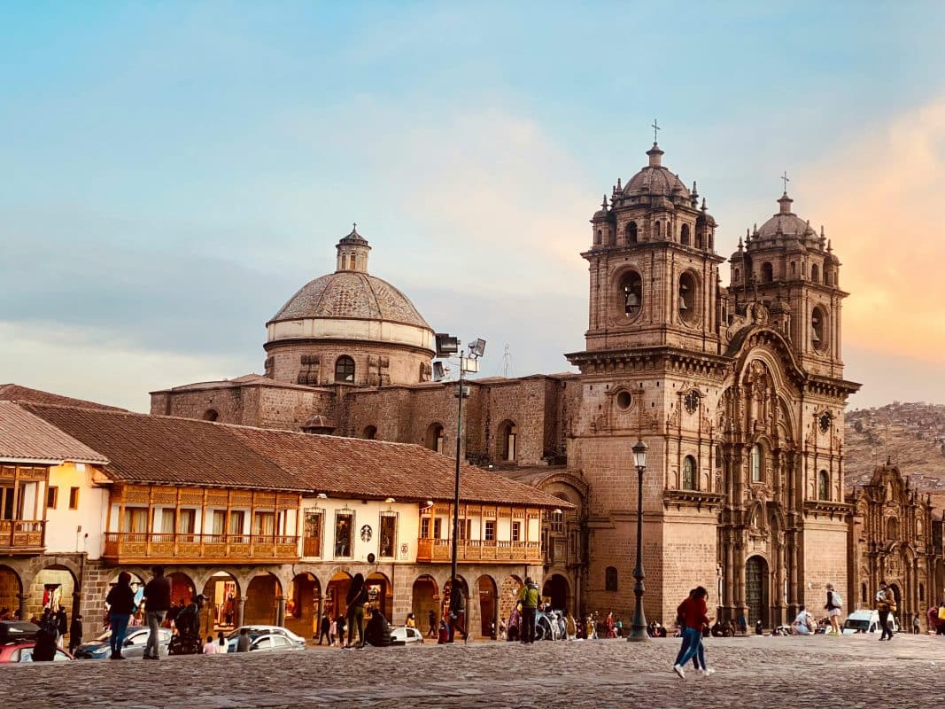 Cusco Plaza de Armas with cathedral at sunset Peru travel guide