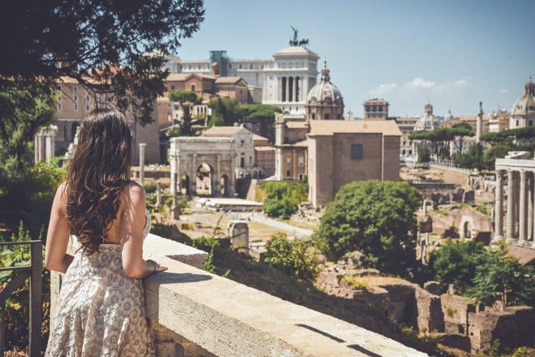view over the Roman Forum in Rome Italy with historic ruins and city skyline
