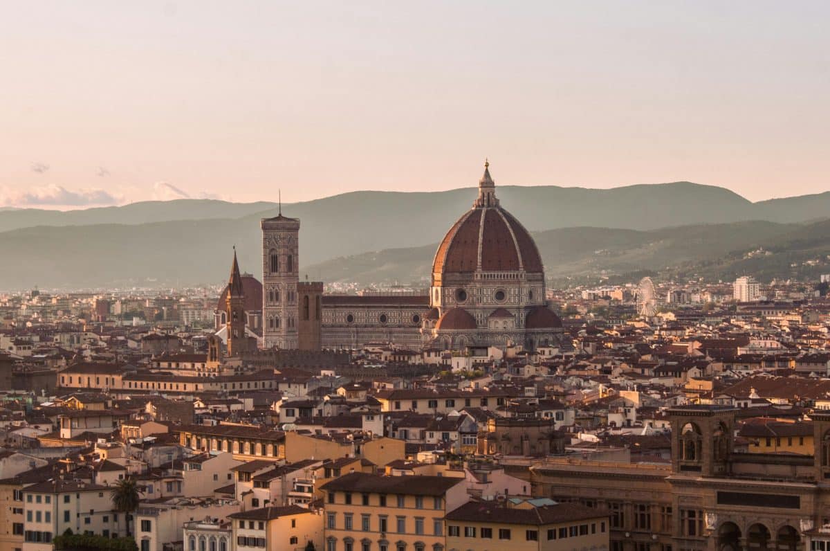 Sunset view over Florence, Italy featuring the Florence Cathedral and city skyline