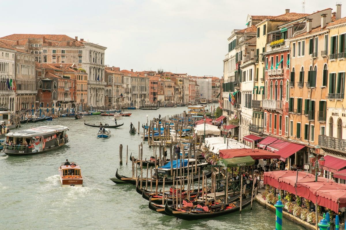 Gondolas and boats along the Grand Canal in Venice, Italy