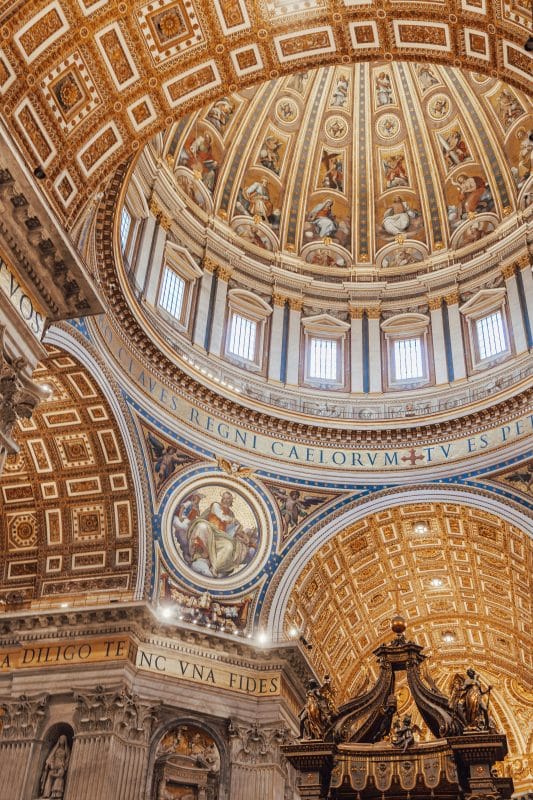 Detailed gold ceiling and interior architecture inside St. Peter’s Basilica in Vatican City