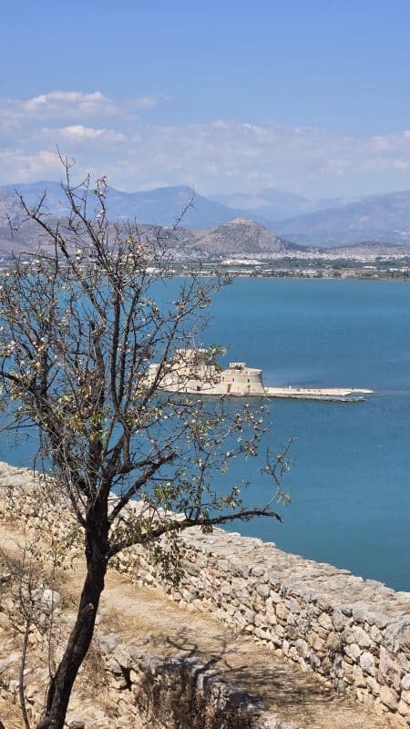 Bourtzi Fortress on the water in Nafplio, Greece, viewed from Palamidi Fortress